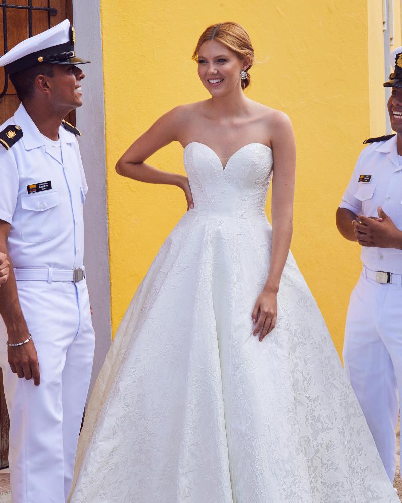 La23112 strapless satin ball gown wedding dress with pockets1